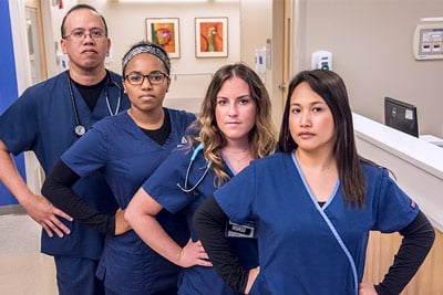Diverse group of serious hospital nurses